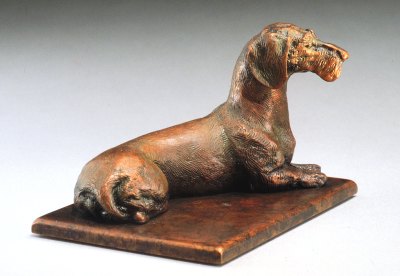 miniature bronze canine sculpture