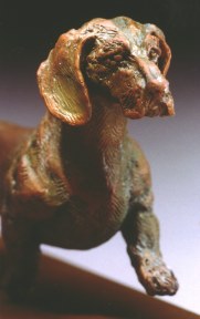 bronze dachshund sculpture by Joy Beckner