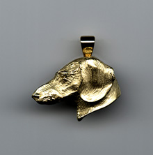 fine art jewelry of canine subjects by Joy Beckner metal artist