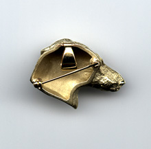 fine art jewelry of canine subjects by Joy Beckner metal artist