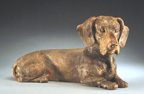 bronze sculpture of dogs by Joy Beckner