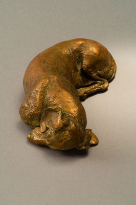 miniature bronze canine sculpture by Joy Beckner