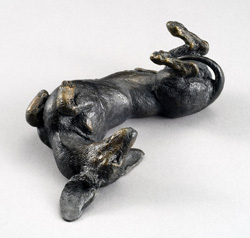 miniature bronze canine sculpture by Joy Beckner
