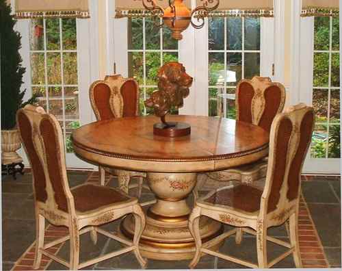 Three Faces of Guineverebronze Golden Retreiver sculpture table setting by Joy Beckner